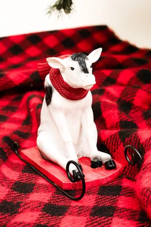 5.5 x 6 Snow Day Sledding Cow Resin Figurine