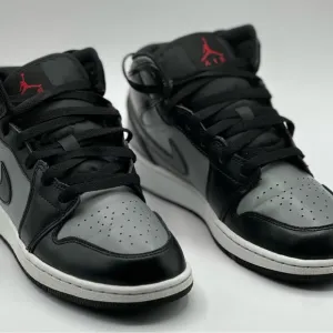 Black and Gray Sneakers with Red Accents