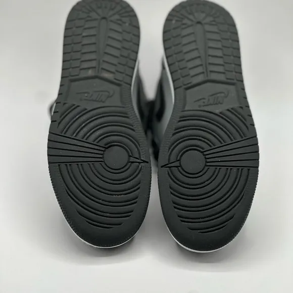 Black and Gray Sneakers with Red Accents